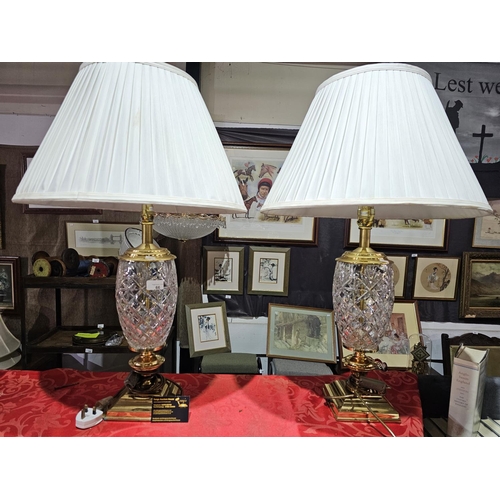 66 - Pair of matching glass and metal table lamps standing approx 50cm tall