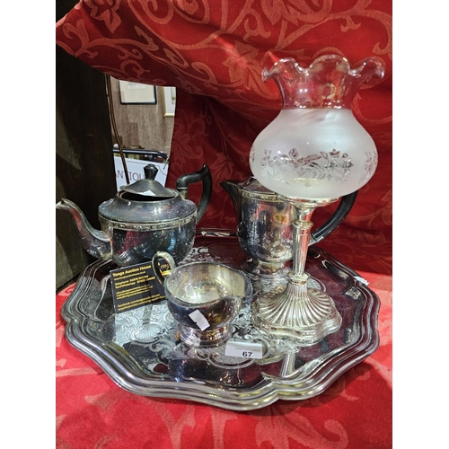 67 - White metal scallop edge tray complete with 2 white metal teapots, a jug and a tealight lamp