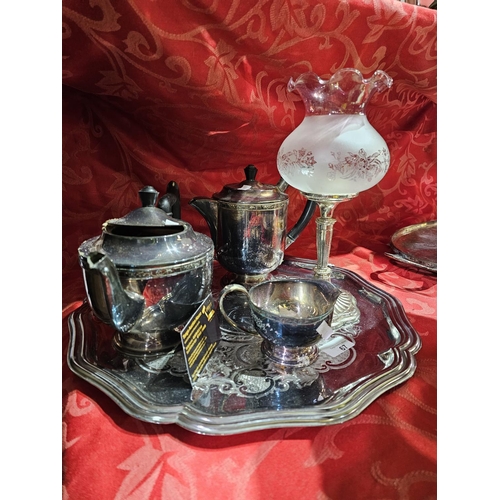 67 - White metal scallop edge tray complete with 2 white metal teapots, a jug and a tealight lamp