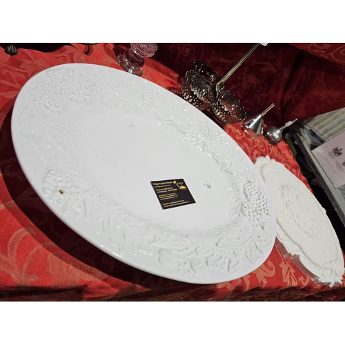 79 - Large white charger, approx 51cm wide together with a white plaster ceiling rose