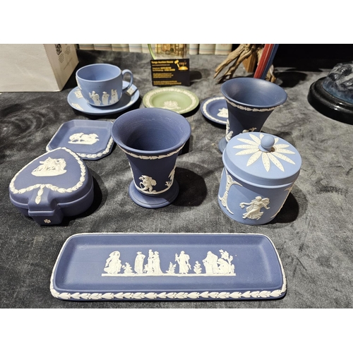 84 - Very large collection of blue and white Jasperware from Wedgwood together with a green and white dis... 