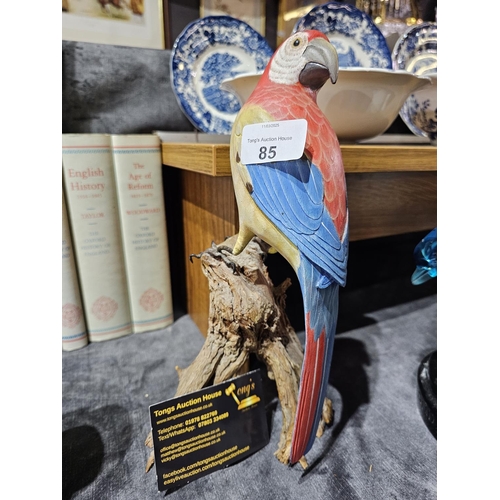 85 - Carved and painted model of a parrot, standing approx 28cm tall