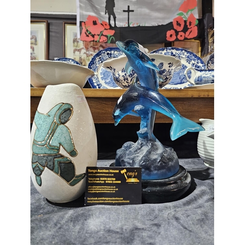 88 - Resin model of dolphins together with a ceramic vase with a dancing figure