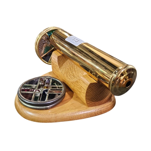 173 - Chesnik-Koch brass and wood kaleidoscope. It features a brass tube and a wheel made of leaded glass ... 