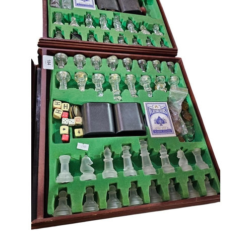 184 - Boxed games compendium with glass chess pieces and board, backgammon glass board and pieces together... 