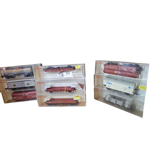 200 - Collection of 9 boxed Fleischmann OO guage model railway wagons and rolling stock