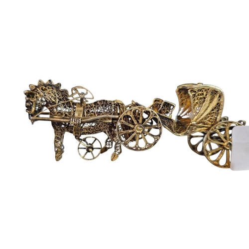 216 - An Italian Filigree metal sculpture of a horse-drawn carriage