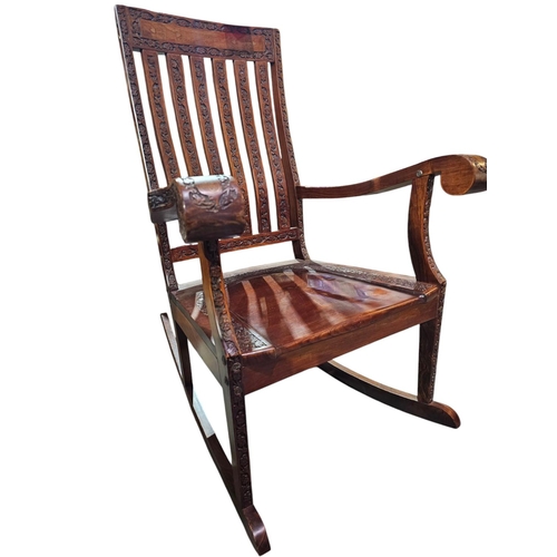 41 - Mahogany hand- carved brass inlaid rocking chair, fabulous quality