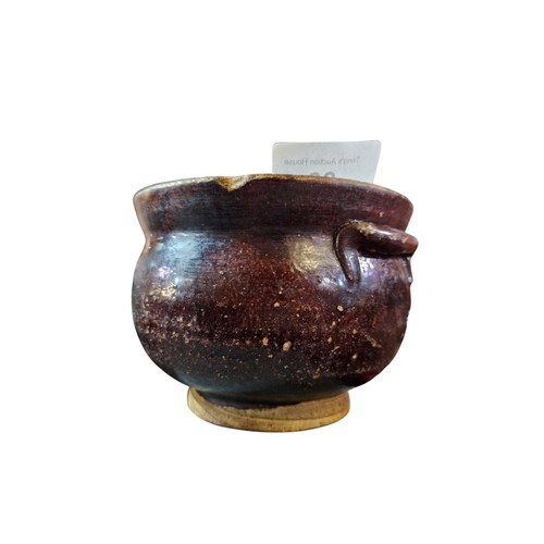 98 - A 19th century rustic bown glazed pot