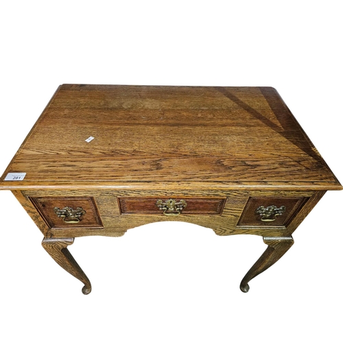 281 - George the III style oak  three drawer lowboy with shaped apron 75cm x 45cm x 74cm high