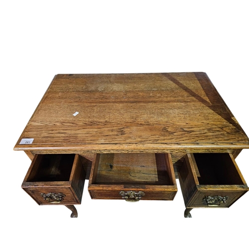 281 - George the III style oak  three drawer lowboy with shaped apron 75cm x 45cm x 74cm high