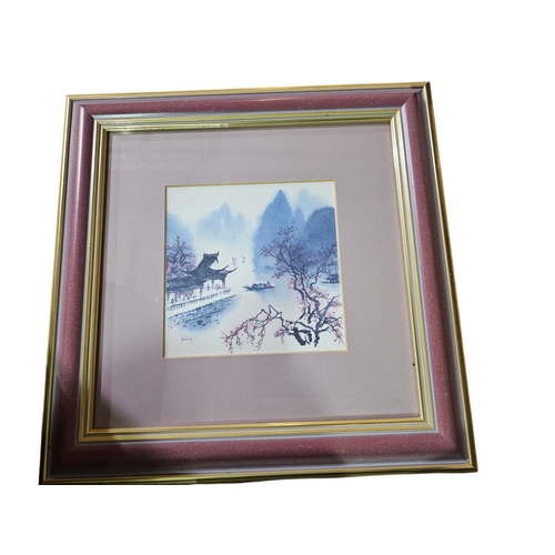 287 - Pair of framed and glazed oriental prints