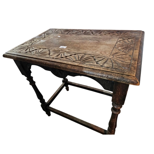 322 - Arts and Crafts carved topped table