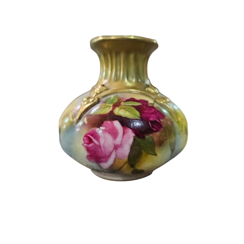 335 - A Royal Worcester blush ivory porcelain vase of lobed form with moulded pendant motifs to the should... 