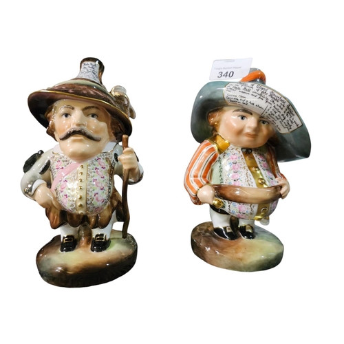 340 - Two Royal Crown Derby models of Mansion House Dwarfs, 16cm