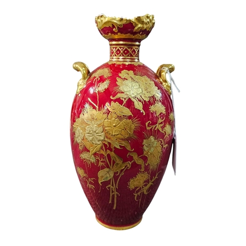 345 - A Royal Crown Derby ovoid twin handled vase with floral gilt tooled decoration against a claret grou... 