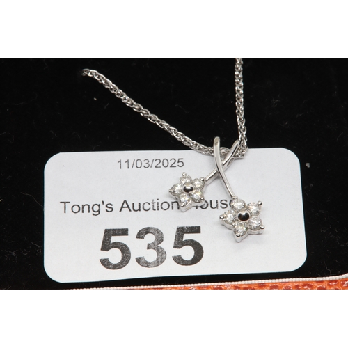 535 - 18ct white gold 750 pendant with 8 diamonds on a 18ct white gold chain 4.9 g