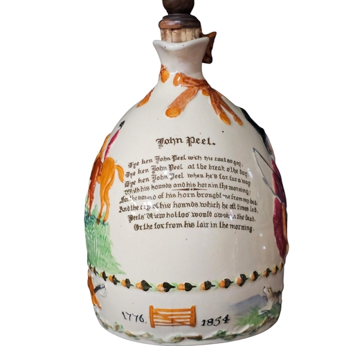 360 - A Crown Devon John Peel flagon, decorated in relief, 20cm