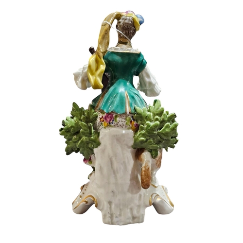 382 - An 18th Century Derby porcelain figure of a Shepherdess playing mandolin no 301 number 3 marked on u... 