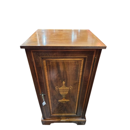 386 - An Edwardian mahogany, night cupboard with satin, wood and boxwood line inlay. The single panel door... 