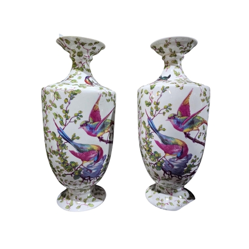 387 - A pair of Victoria Austria vases 26cm in height