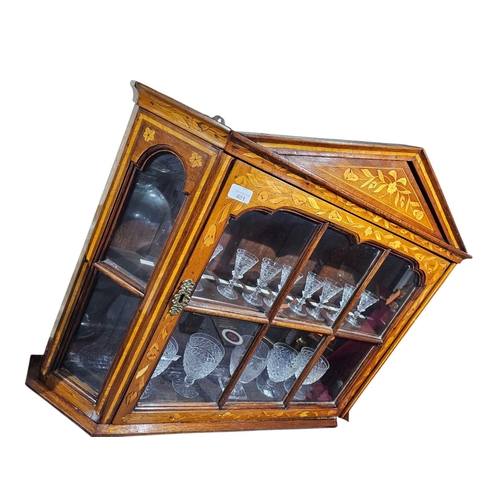 401 - A stunning 19th century, mahogany and Dutch marquetry hanging display cupboard with triangular pedim... 