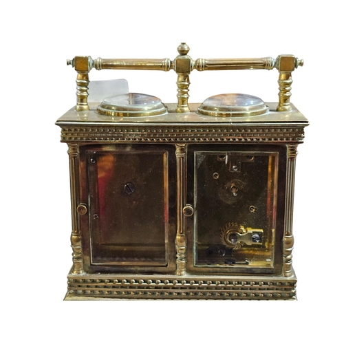 405 - An early 20th century timepiece and barometer within a carriage clock type case with double handle a... 