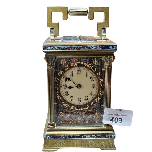 409 - A late 19th century guilt brass carriage clock, the case with 3/4 Corinthian fluted corners, columns... 