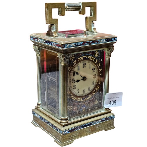 409 - A late 19th century guilt brass carriage clock, the case with 3/4 Corinthian fluted corners, columns... 