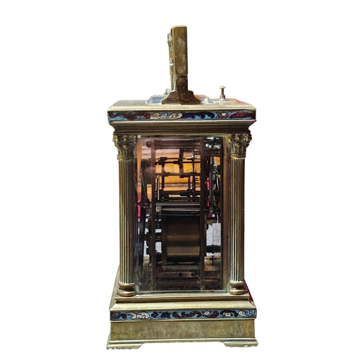 409 - A late 19th century guilt brass carriage clock, the case with 3/4 Corinthian fluted corners, columns... 