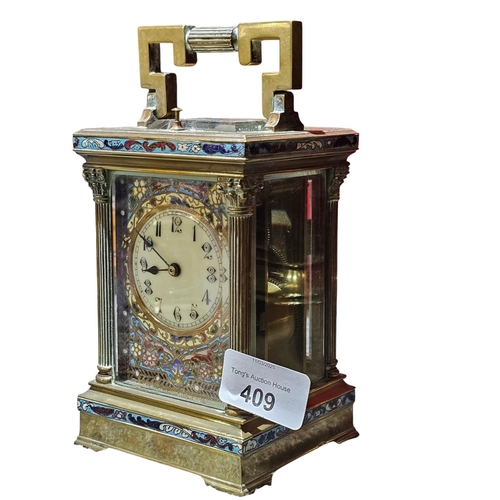 409 - A late 19th century guilt brass carriage clock, the case with 3/4 Corinthian fluted corners, columns... 