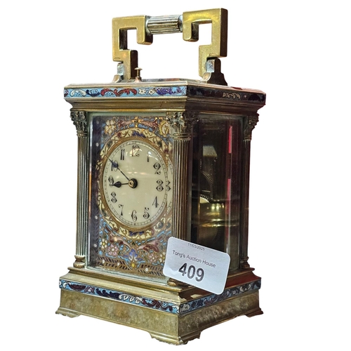 409 - A late 19th century guilt brass carriage clock, the case with 3/4 Corinthian fluted corners, columns... 