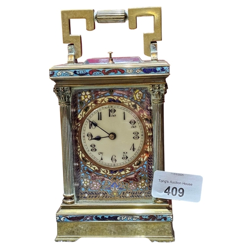 409 - A late 19th century guilt brass carriage clock, the case with 3/4 Corinthian fluted corners, columns... 