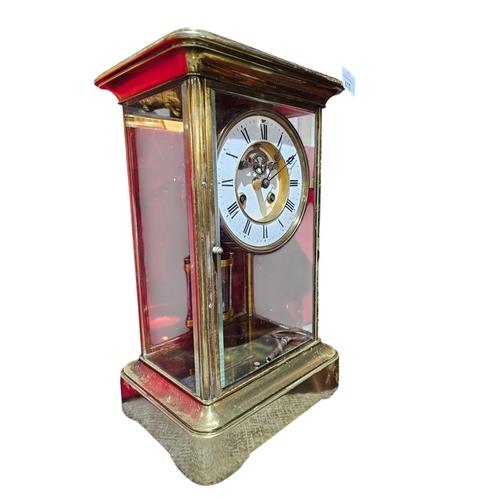 410 - A late 19th century Victorian 'Four Glass' mantel clock by Samuel Marti.

The clock has a gilded bra... 