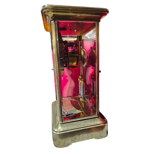 410 - A late 19th century Victorian 'Four Glass' mantel clock by Samuel Marti.

The clock has a gilded bra... 