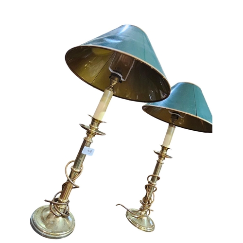 436 - Pair of brass candle stick lamps with green shades