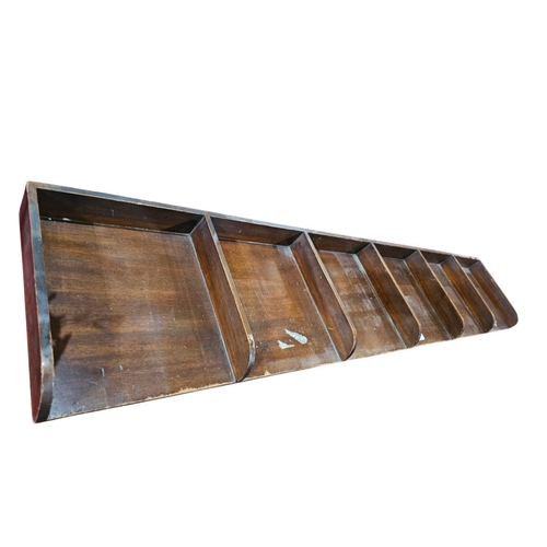 445 - 20th century desk trays 150cm in length