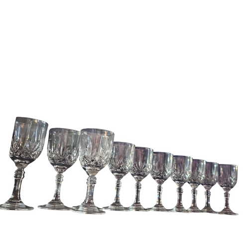 457 - Collection of 11 cut glass small wine / sherry glasses