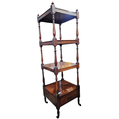 475 - Early Victorian mahogany whatnot the four square tiers spaced by turned corner supports above an und... 