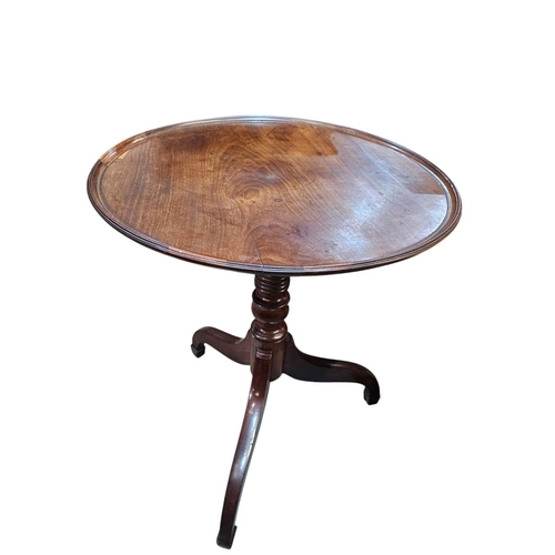 478 - A late Georgian fruitwood tilt top wine table