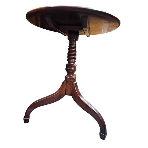 478 - A late Georgian fruitwood tilt top wine table