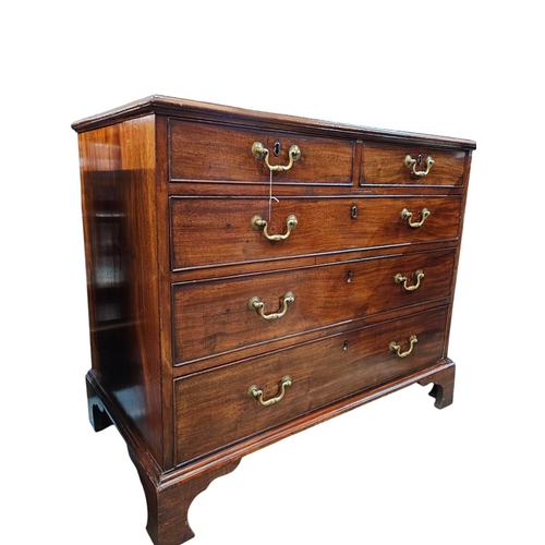 482 - A George The Third mahogany chest of two short and three long graduated drawers raised on shaped bra... 