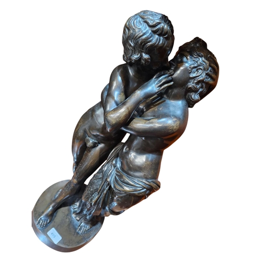 495 - A late 19th century French  patinated bronze group of lovers poised in an embrace. He nude save a fi... 