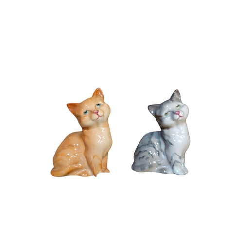 499 - 2 Royal Doulton porcelain cats