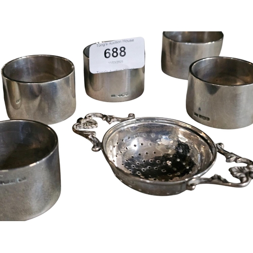 688 - Set of 6 silver hallmarked napkin rings 62g in weight EACH and antique silver hallmarked tea straine... 