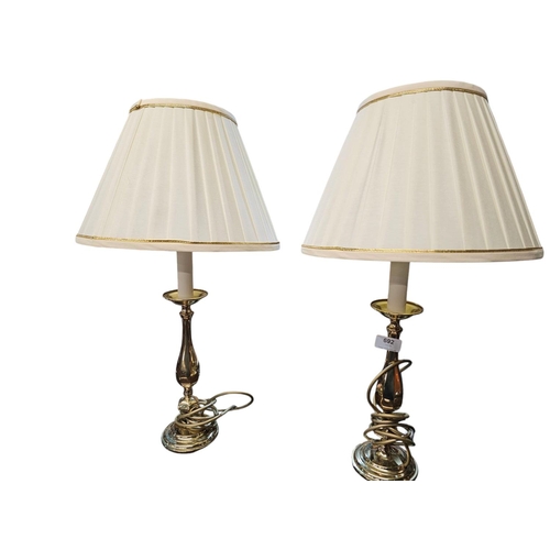 692 - Pair of brass candle stick style table lamps