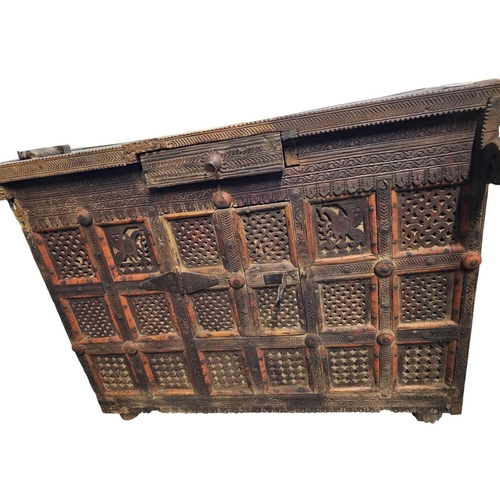 704 - A stunning early 19th century Indian Dower chest beautifully carved and pierced front