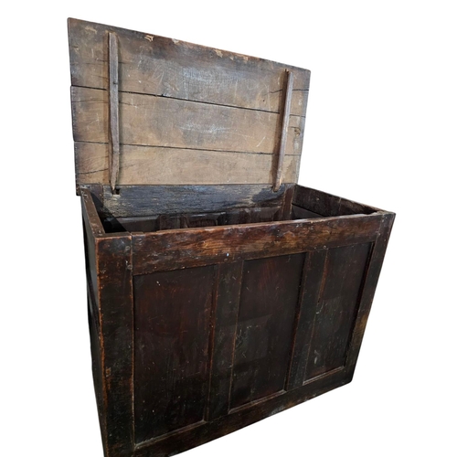 709 - A George I panelled front coffer with planked top wooden hinge and pegged top. Stunning antique piec... 