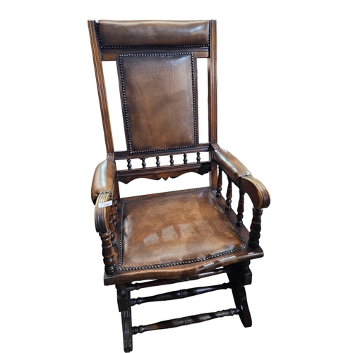 726 - Stunning American rocking chair with leather seat and back and beautiful spindle work