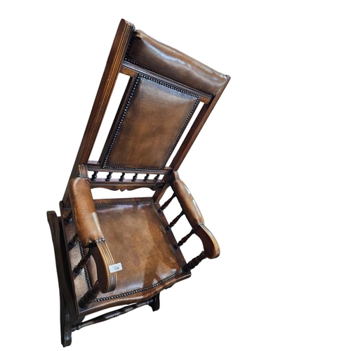 726 - Stunning American rocking chair with leather seat and back and beautiful spindle work